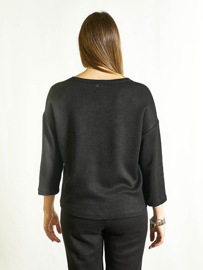 MAGLIA NERA CON CUORE FUCSIA