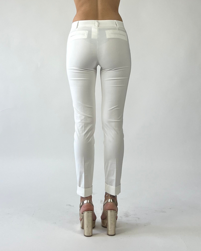 PANTALONE SKINNY TINTA UNITA CON RISVOLTO BIANCO