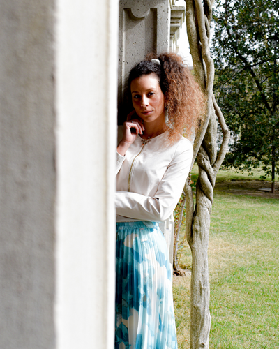 GIACCA CORTA IN ECOPELLE  CON ZIP BIANCA