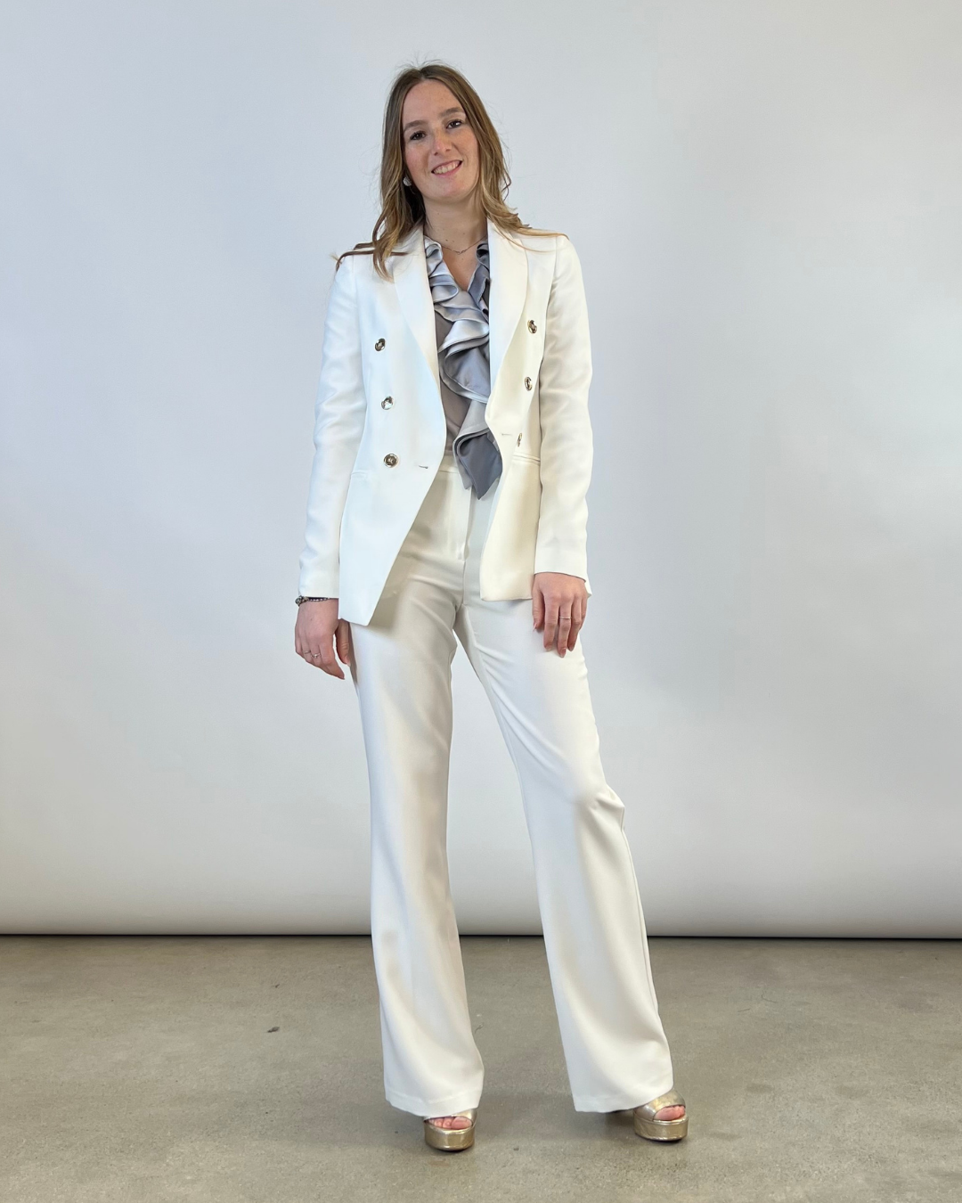 Pantalone a sales zampa bianco elegante